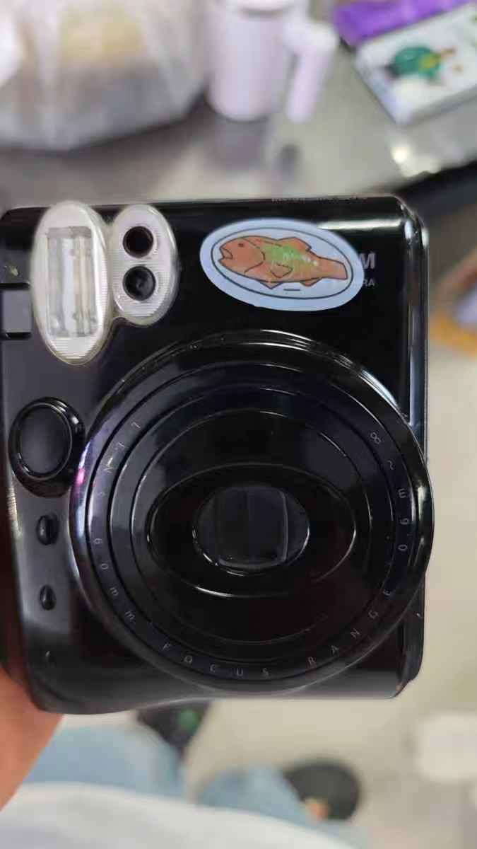 拍立得mini50s相机开机屏幕显示一下就灭拆解维修