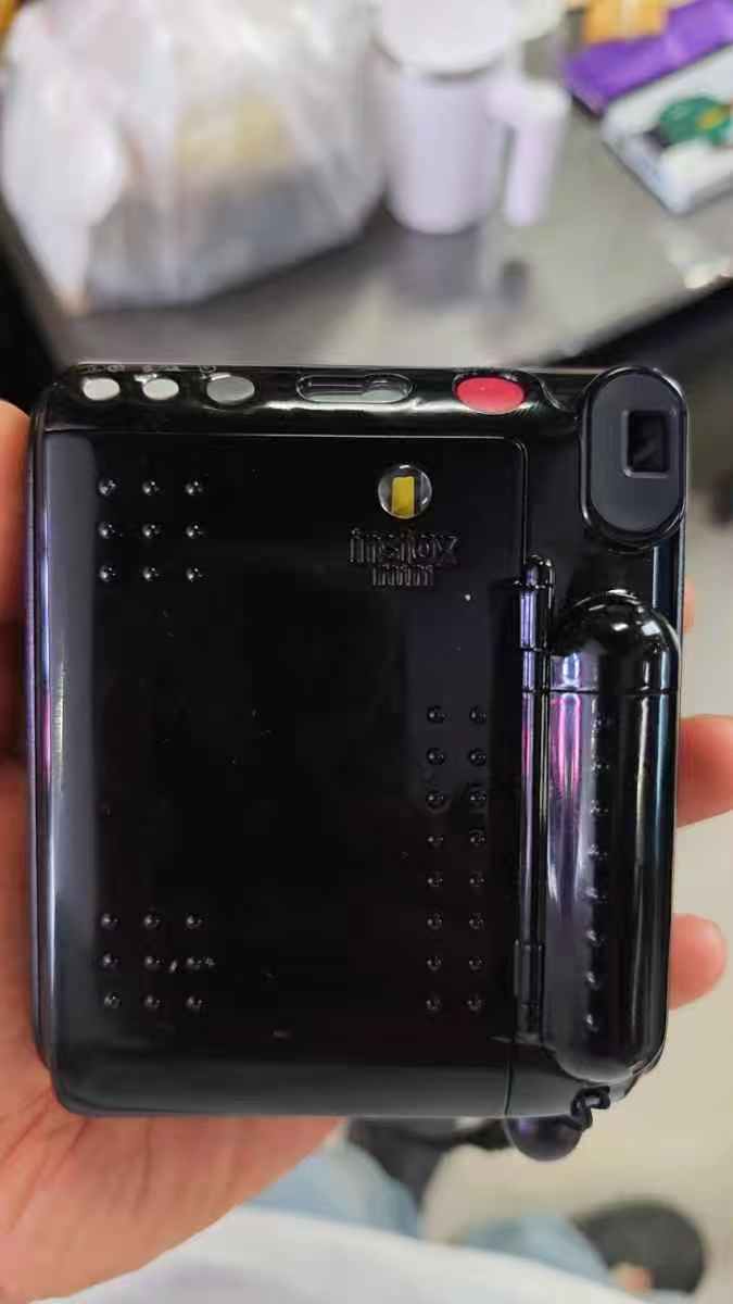 拍立得mini50s相机开机屏幕显示一下就灭拆解维修