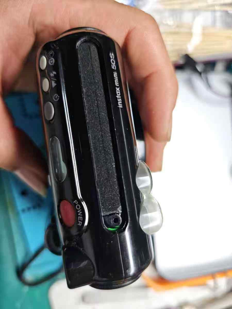 拍立得mini50s相机开机屏幕显示一下就灭拆解维修