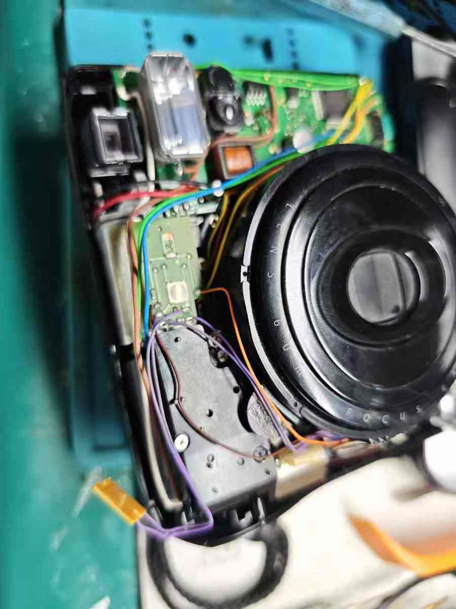 拍立得mini50s相机开机屏幕显示一下就灭拆解维修