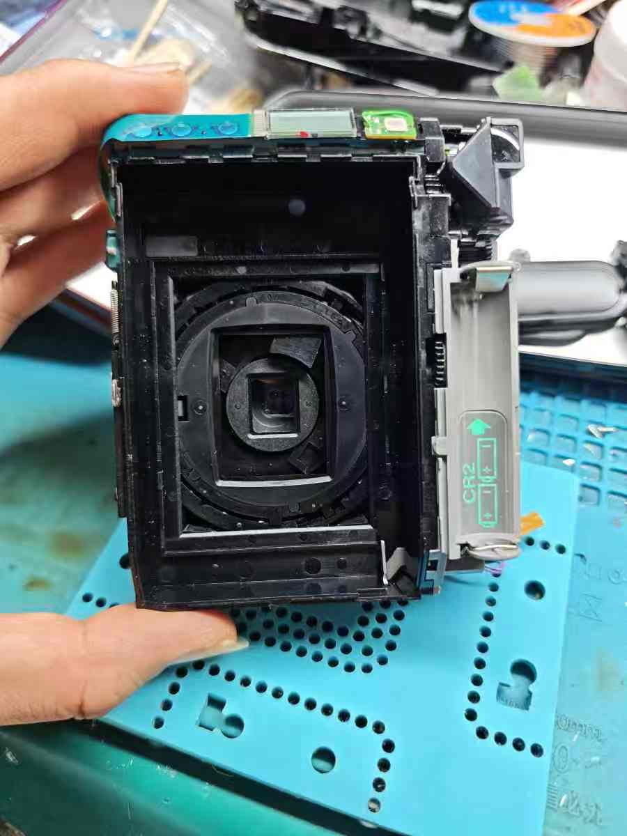 拍立得mini50s相机开机屏幕显示一下就灭拆解维修